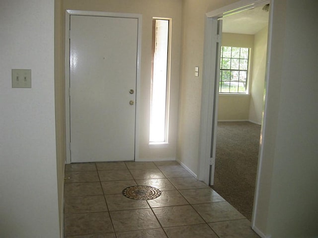 entryway featuring tile patterned flooring