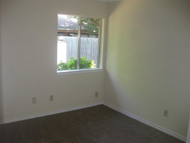 view of carpeted spare room