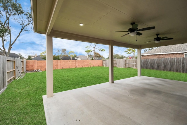 view of patio featuring ceiling fan