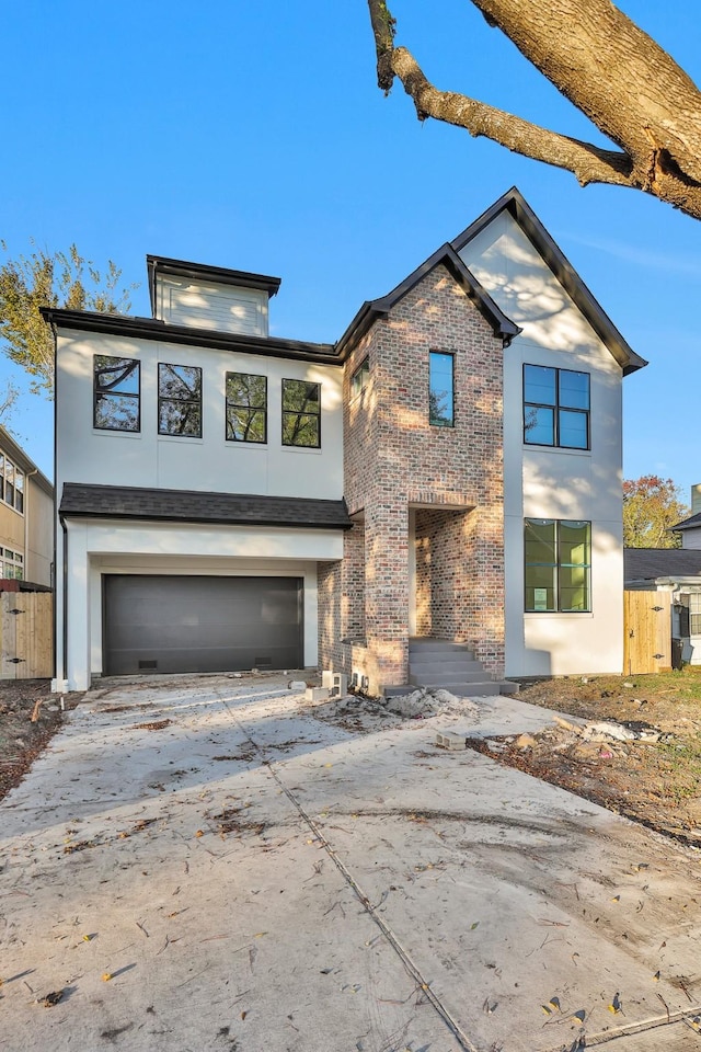 contemporary house featuring a garage