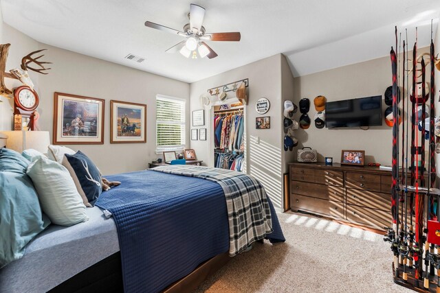 bedroom featuring carpet flooring, ceiling fan, and a closet