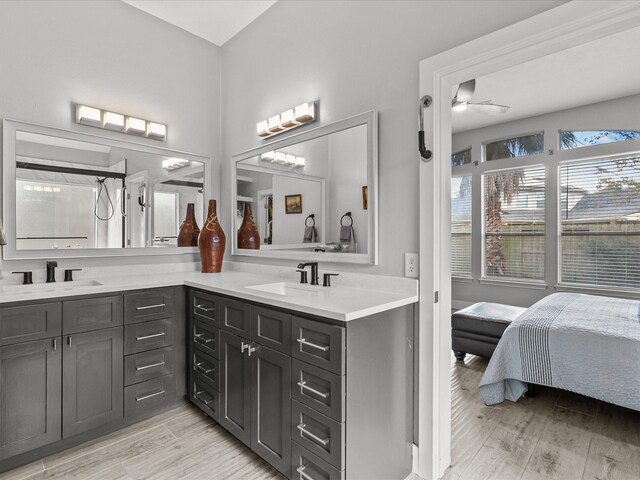 bathroom featuring vanity and hardwood / wood-style flooring