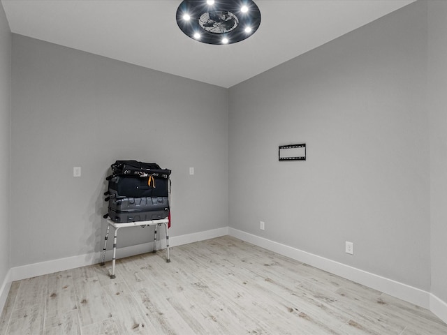 spare room featuring light hardwood / wood-style floors