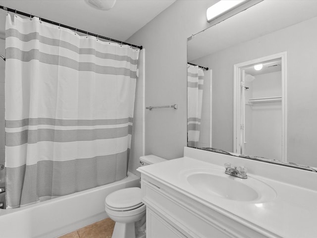 full bathroom featuring tile patterned flooring, vanity, shower / bath combo, and toilet