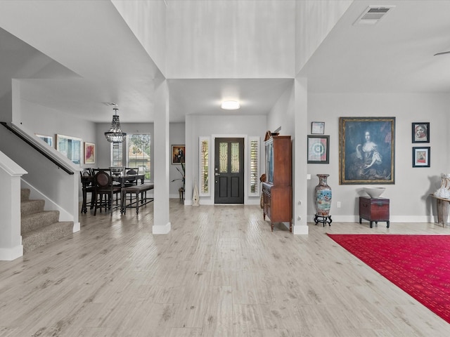 entrance foyer with light wood-type flooring