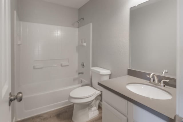 full bathroom with vanity, toilet, and bathing tub / shower combination