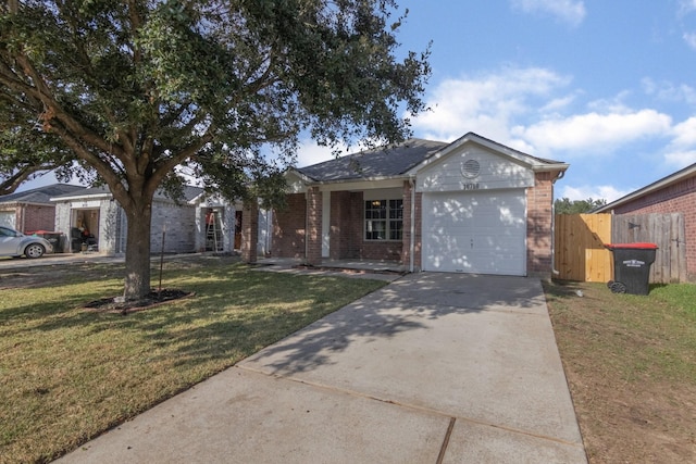 ranch-style house featuring a front lawn and a garage