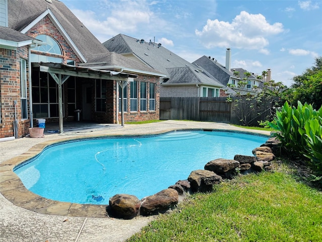 view of swimming pool with a patio area and a pergola