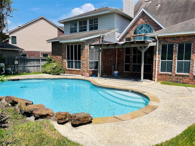 view of pool featuring a pergola and a patio