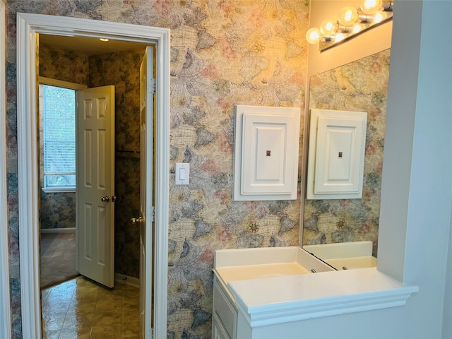 bathroom with tile patterned flooring and electric panel