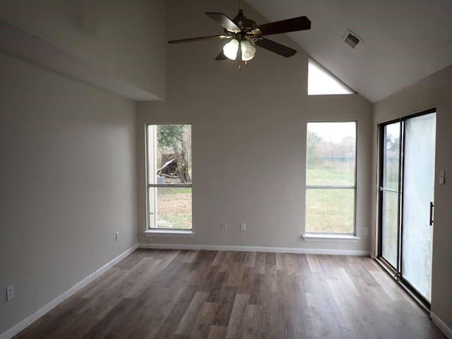 unfurnished room featuring wood-type flooring, high vaulted ceiling, and ceiling fan