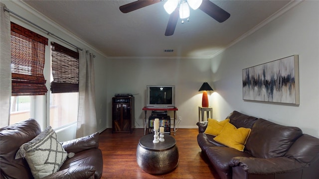 living room with ceiling fan, dark hardwood / wood-style flooring, and ornamental molding