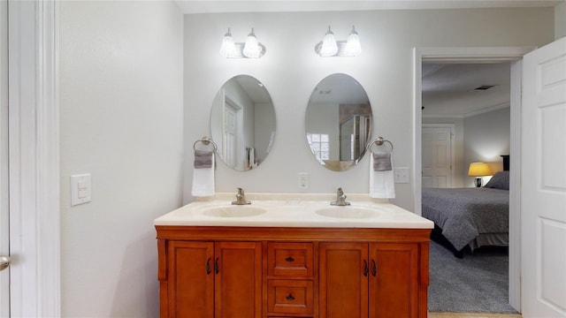 bathroom featuring vanity and crown molding