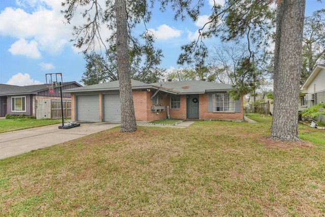 ranch-style house featuring a front lawn and a garage