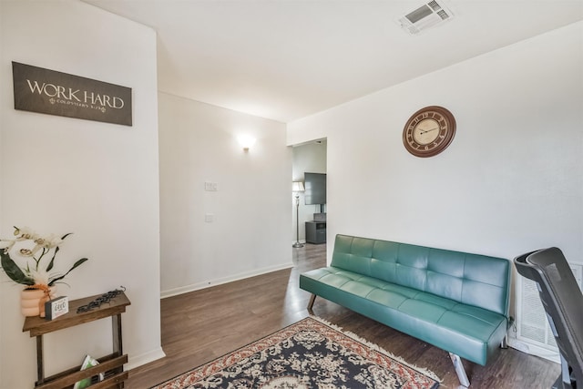 living room featuring dark hardwood / wood-style flooring