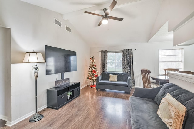 living room with vaulted ceiling with beams, ceiling fan, and wood-type flooring