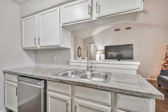 kitchen featuring kitchen peninsula, sink, wood-type flooring, dishwasher, and white cabinetry