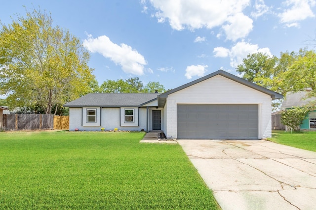 ranch-style house with a garage and a front lawn