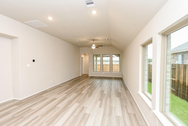 unfurnished living room with ceiling fan, light hardwood / wood-style flooring, and lofted ceiling