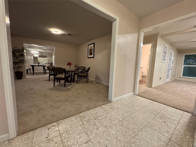 view of carpeted dining area