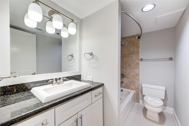 full bathroom featuring vanity, tile patterned floors, tiled shower / bath combo, and toilet