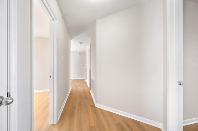 hall featuring light hardwood / wood-style floors