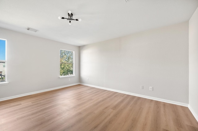 empty room with light wood-type flooring