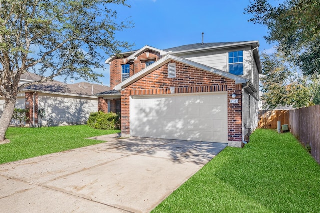 view of property with a front yard and a garage