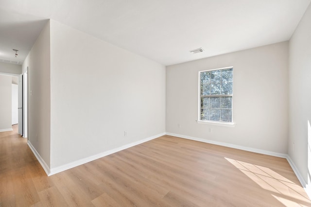 empty room featuring light hardwood / wood-style flooring