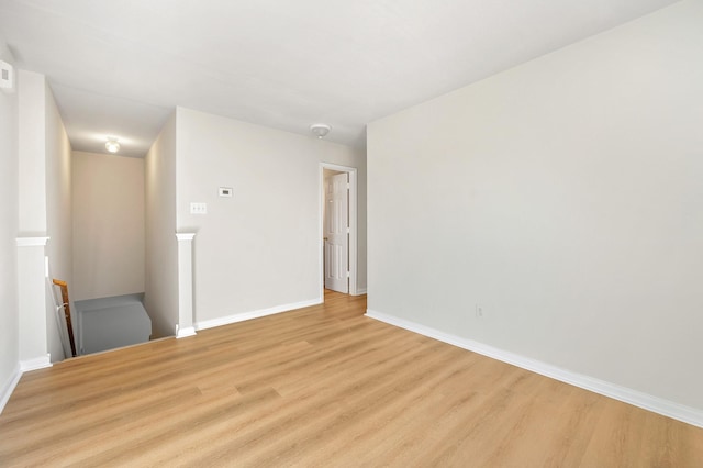 empty room featuring light hardwood / wood-style floors