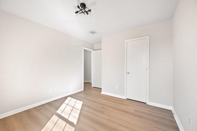 unfurnished bedroom featuring light hardwood / wood-style flooring