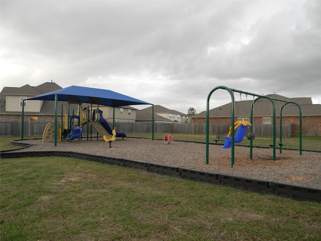 view of playground featuring a lawn