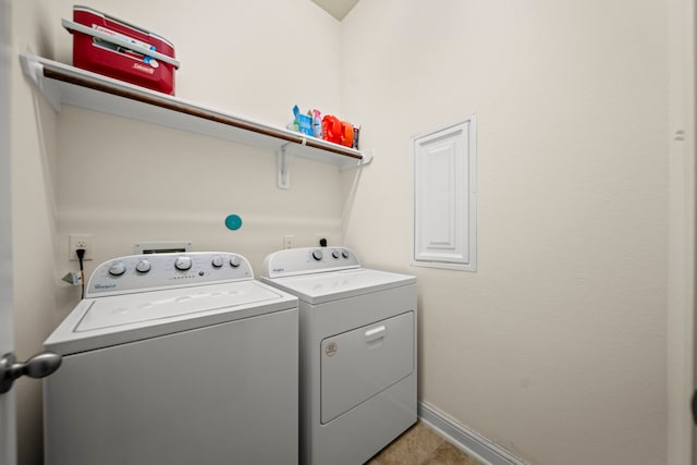 laundry room with washer and dryer