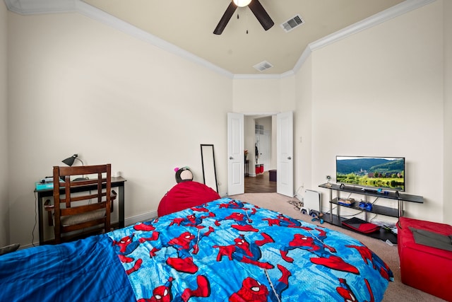 carpeted bedroom featuring crown molding and ceiling fan