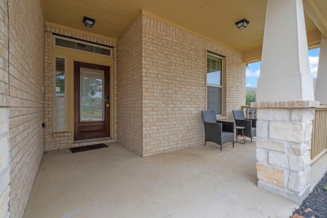 doorway to property featuring a porch