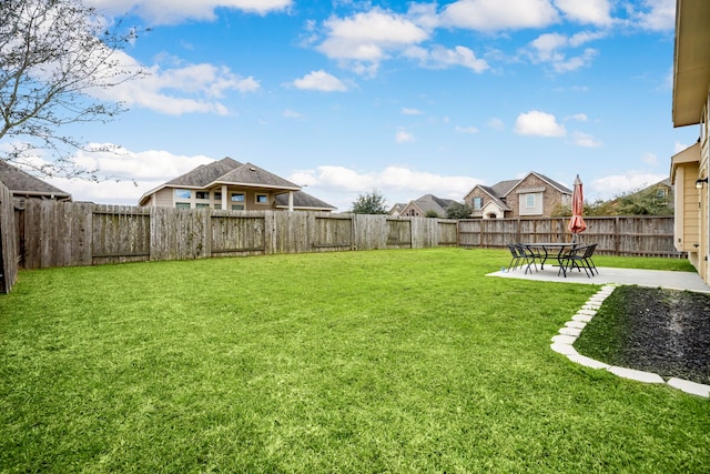 view of yard featuring a fenced backyard and a patio area