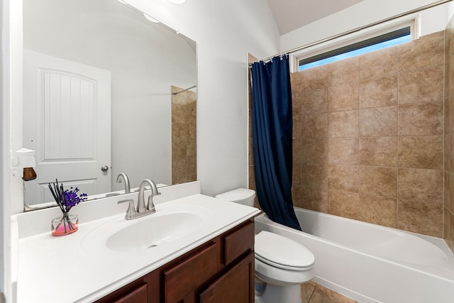 bathroom with vanity, tile patterned floors, toilet, and shower / tub combo with curtain