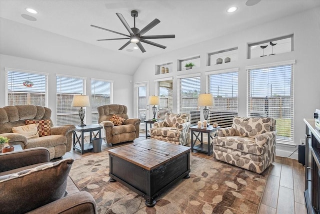 living room featuring light wood-style floors, lofted ceiling, a ceiling fan, and recessed lighting