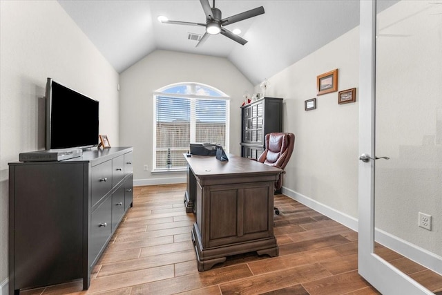 office area with lofted ceiling, wood tiled floor, baseboards, and a ceiling fan