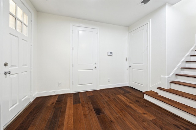 foyer featuring dark hardwood / wood-style floors