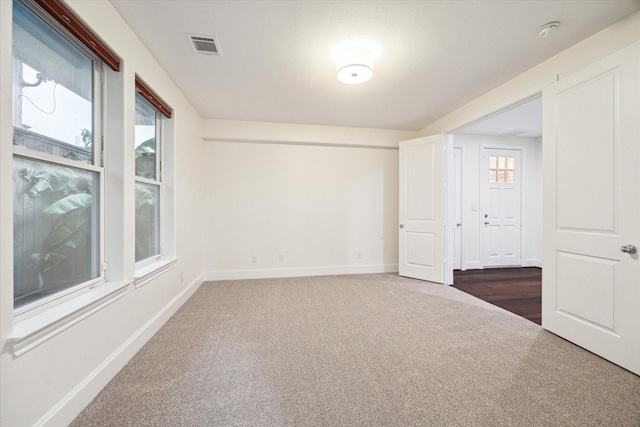 view of carpeted spare room