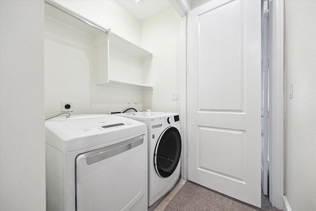 laundry room with washing machine and dryer