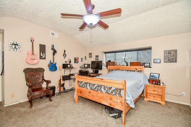 bedroom featuring ceiling fan, vaulted ceiling, a textured ceiling, and carpet flooring