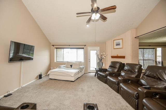 carpeted bedroom with vaulted ceiling, ceiling fan, a textured ceiling, and access to outside