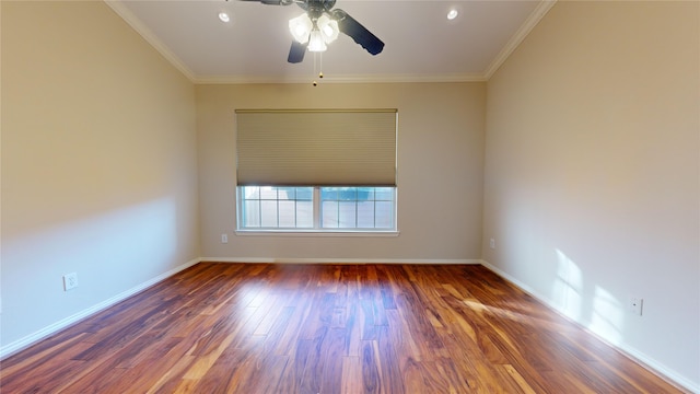 spare room with crown molding, ceiling fan, and dark hardwood / wood-style floors