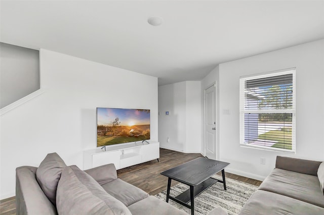 living room featuring dark hardwood / wood-style floors