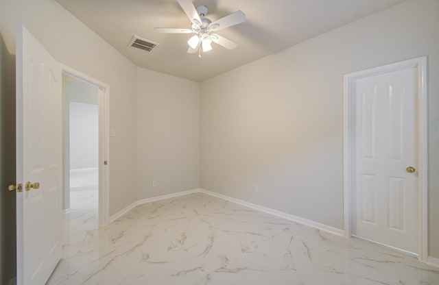 unfurnished room featuring ceiling fan