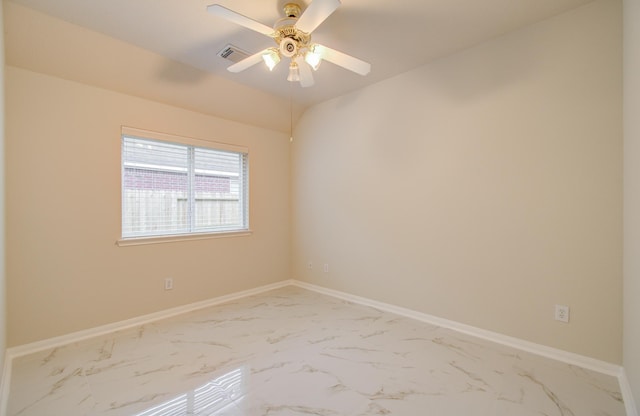 spare room with ceiling fan