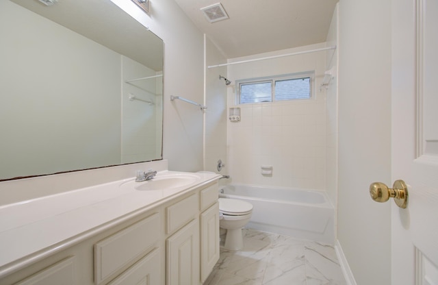 full bathroom with toilet, vanity, and tiled shower / bath combo