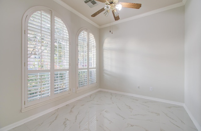 empty room with ceiling fan and crown molding